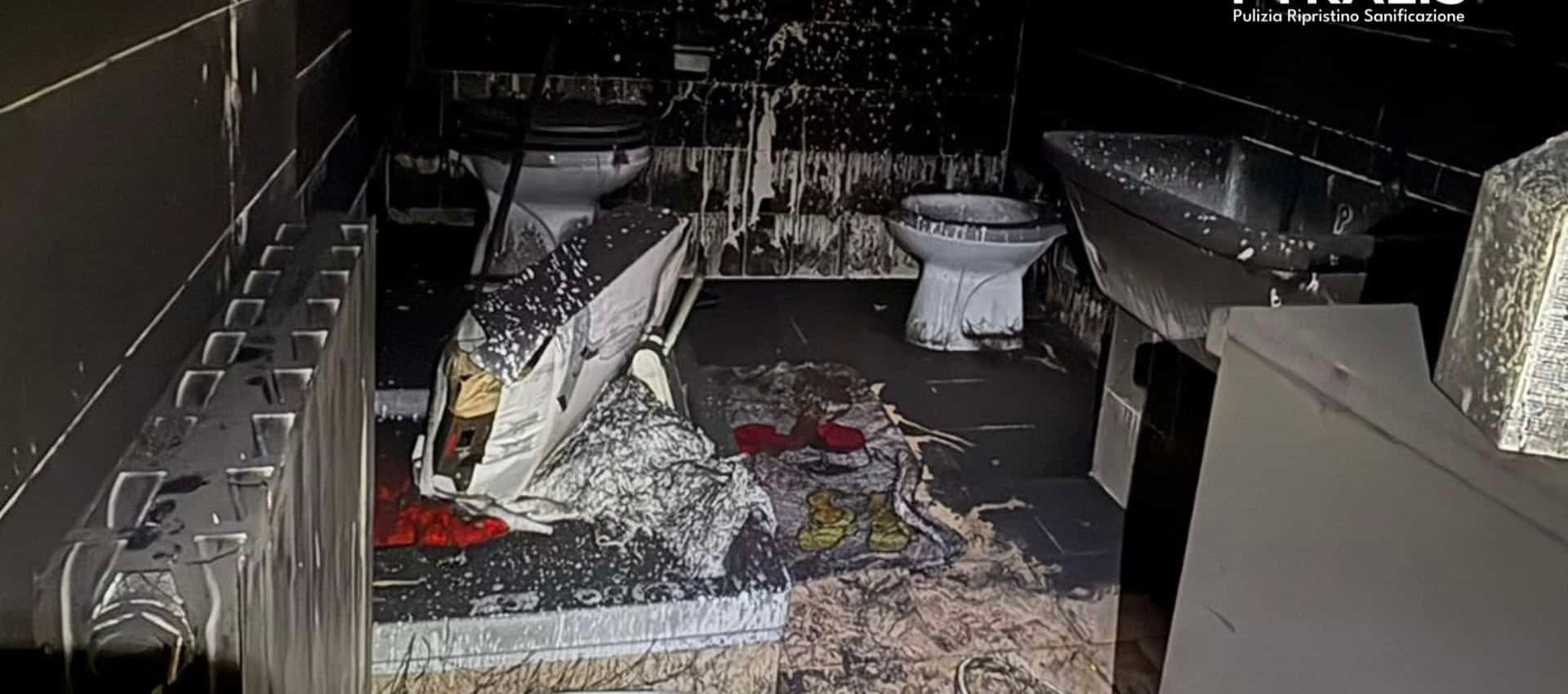 Cucina danneggiata dal fuoco, prima dell'intervento
